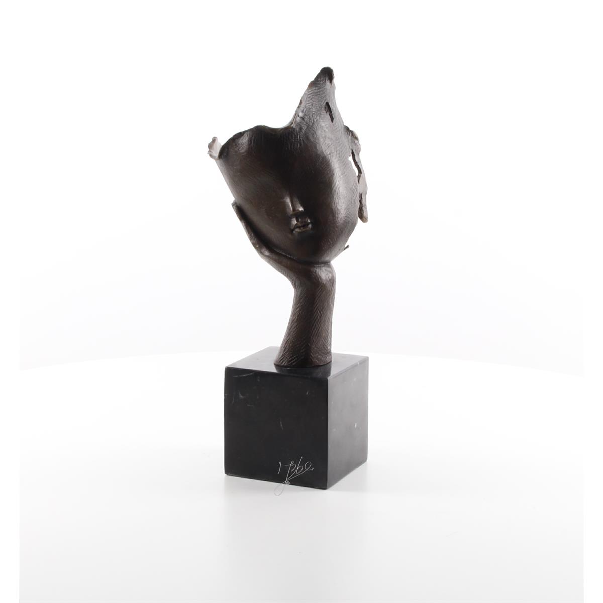 BRONZEN\u0020BEELD\u0020VAN\u0020EEN\u0020GEZICHT\u0020DAT\u0020OP\u0020EEN\u0020HANDPALM\u0020RUST