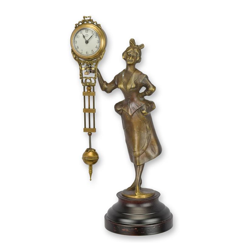 A\u0020MYSTERIEUSE\u0020TABLE\u0020CLOCK\u0020SHAPED\u0020AS\u0020A\u0020WOMAN