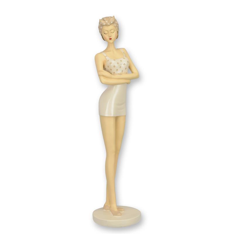 A\u0020RESIN\u0020FIGURINE\u0020OF\u0020A\u0020RETRO\u0020BEACH\u0020GIRL