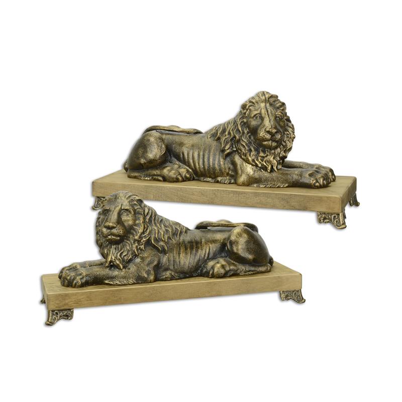 A\u0020PAIR\u0020OF\u0020CAST\u0020IRON\u0020RECLINING\u0020LIONS\u0020MOUNTED\u0020ON\u0020A\u0020WOODEN\u0020BASE