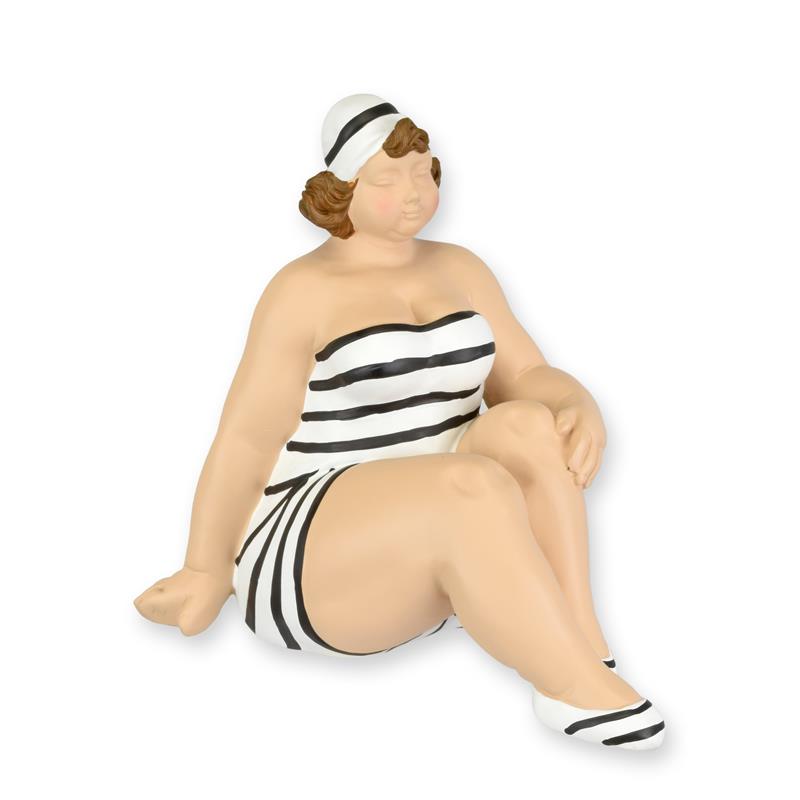 A\u0020RESIN\u0020FIGURINE\u0020OF\u0020A\u0020WOMAN\u0020IN\u0020SWIMSUIT