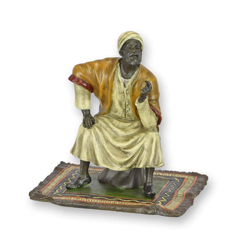 A\u0020BRONZE\u0020SCULPTURE\u0020OF\u0020AN\u0020ORIENTAL\u0020MERCHANT\u0020ON\u0020CARPET