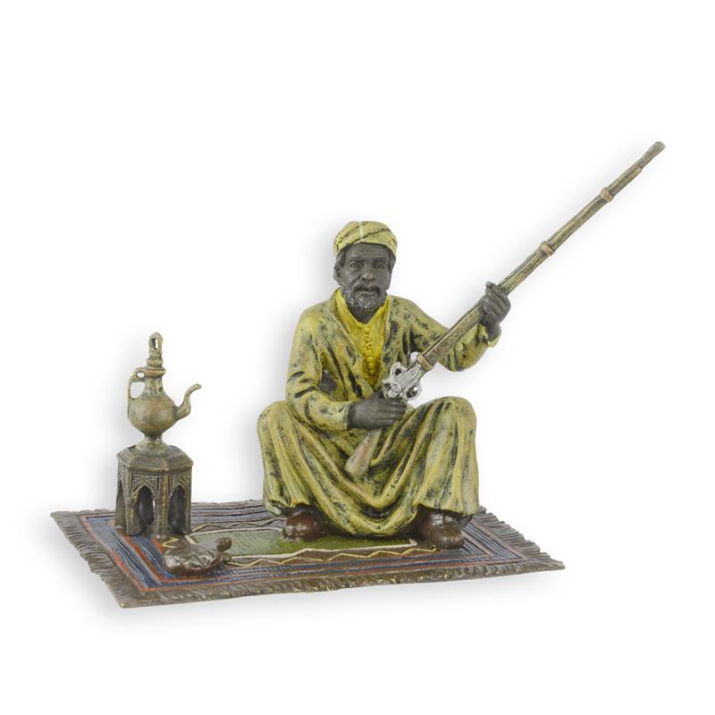 A\u0020BRONZE\u0020SCULPTURE\u0020OF\u0020AN\u0020ARAB\u0020HUNTER\u0020ON\u0020CARPET