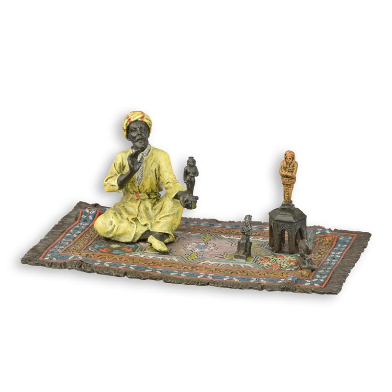 A\u0020BRONZE\u0020SCULPTURE\u0020OF\u0020AN\u0020ORIENTAL\u0020FIGURINE\u0020SELLER