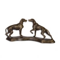 TWO CAST IRON HOUNDS MOUNTED ON A BASE