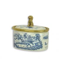 A BRONZE MOUNTED PORCELAIN BOX AND COVER