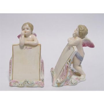 A PAIR OF PORCELAIN MENU STANDS