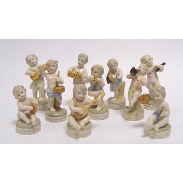 A SET OF 10 PORCELAIN PUTTI MUSICIANS