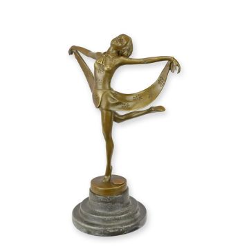A BRONZE SCULPTURE OF A FEMALE DANCER