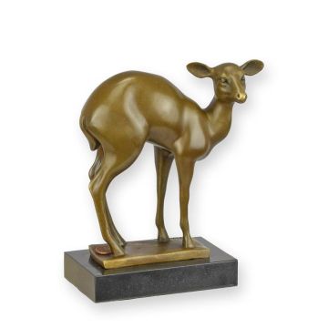 A BRONZE SCULPTURE OF A FAUN