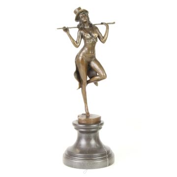 A BRONZE SCULPTURE OF A REVUE DANCER