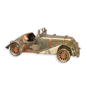 A TIN MODEL OF A CLASSIC CAR
