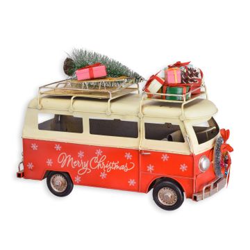 A TIN MODEL OF A CHRISTMAS BUS