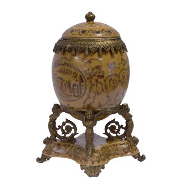 A BRONZE MOUNTED PORCELAIN EGG SHAPED BOX