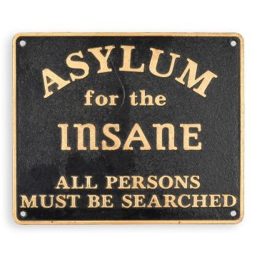 A CAST IRON "ASYLUM FOR THE INSANE" PLAQUE