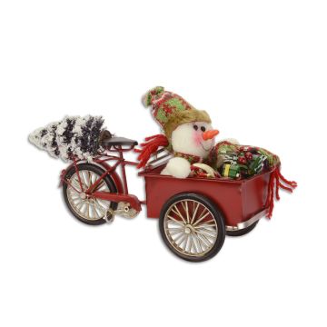 A TIN MODEL OF A CARGO BIKE IN CHRISTMAS STYLE