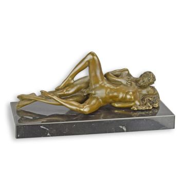 AN EROTIC BRONZE SCULPTURE