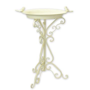 AN IRON BIRD BATH, OLD WHITE