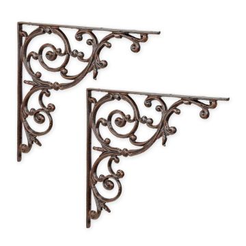 A PAIR OF CAST IRON WALL BRACKETS