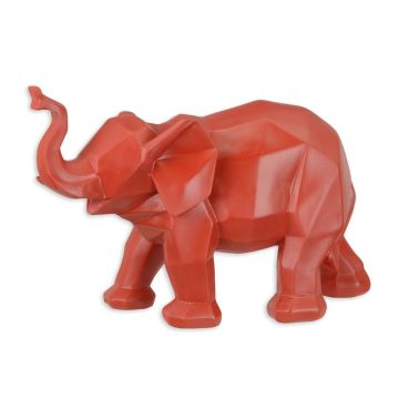 A RESIN POLYGONAL FIGURINE OF AN ELEPHANT, RED