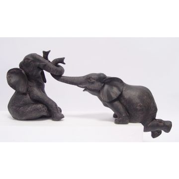 A PAIR OF RESIN ELEPHANTS