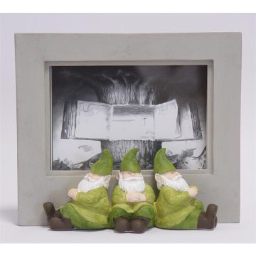 A RESIN PHOTO FRAME FLANKED BY 3 SITTING GNOMES