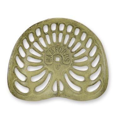 A CAST IRON TRACTOR SEAT, BROWN
