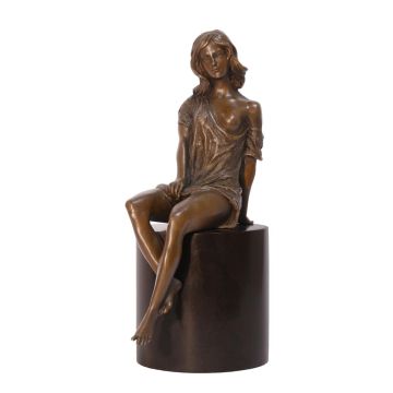 A BRONZE SCULPTURE OF A SEMI NUDE FEMALE