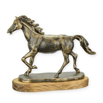 A CAST IRON FIGURINE OF A HORSE
