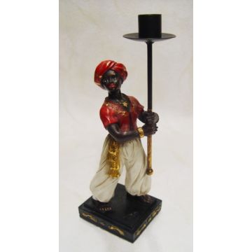 A RESIN VASSAL CANDLE HOLDER