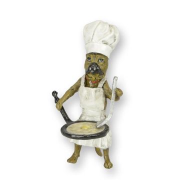 A BRONZE SCULPTURE OF A PUG BAKING EGGS