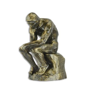 A CAST IRON SCULPTURE OF THE THINKER