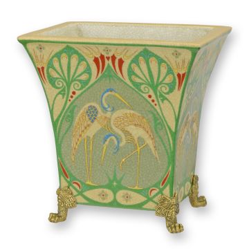 A BRONZE MOUNTED PORCELAIN PLANTER