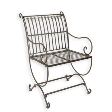A BROWN IRON ARM CHAIR