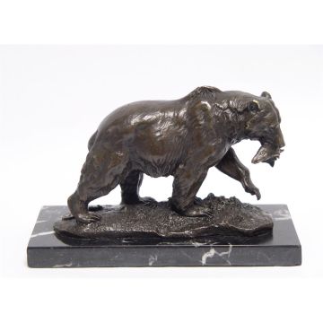 A BRONZE SCULPTURE OF A GRIZZLY BEAR