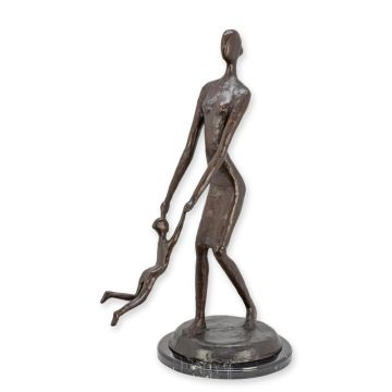 A MODERN BRONZE SCULPTURE OF A WOMAN ON A MARBLE BASE