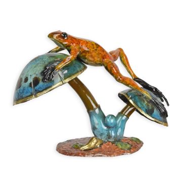 A BRONZE SCULPTURE OF A FROG SITTING ON A MUSHROOM