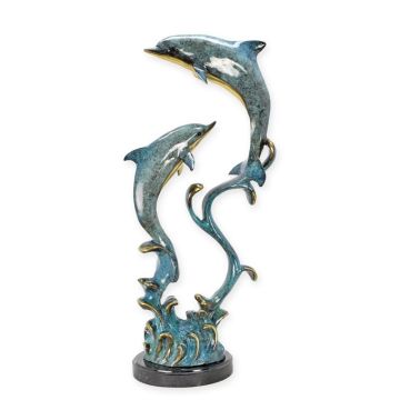 A BRONZE SCULPTURE OF A TWO DOLPHINS ON A WAVE