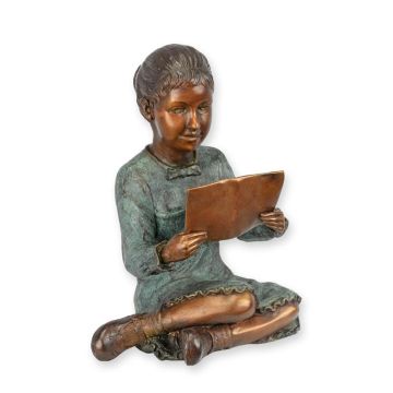 A BRONZE SCULPTURE OF A GIRL READING