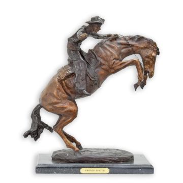 A BRONZE SCULPTURE NAMED "BRONCO BUSTER"