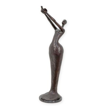 A MODERNIST BRONZE SCULPTURE OF A WOMAN HOLDIGN A BIRD