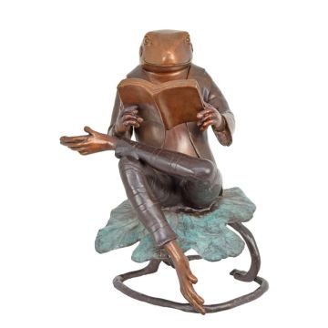A BRONZE SCULPTURE OF A READING FROG