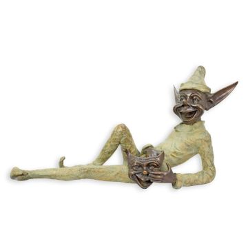 A BRONZE SCULPTURE OF A LYING GOBLIN