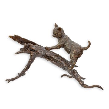 A BRONZE SCULPTURE OF A CAT AND RAT ON A LOG
