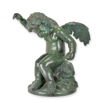 A BRONZE SCULPTURE OF A WINGED PUTTI