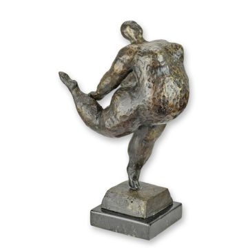 A MODERNIST BRONZE SCULPTURE OF A FEMALE NUDE DANCER