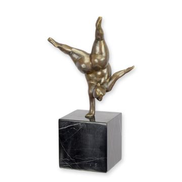 A MODERNIST BRONZE SCULPTURE OF A BALANCING LADY