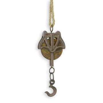 A CAST IRON PULLEY ON ROPE