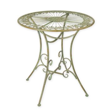 A ROUND IRON GARDEN TABLE