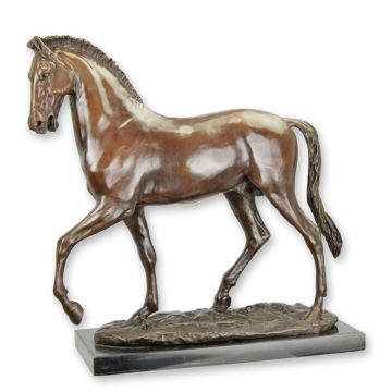 A BRONZE SCULPTURE OF A TROTTING HORSE